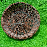 Elegant, Durable Round serving basket filled with assorted rolls on a dining table
