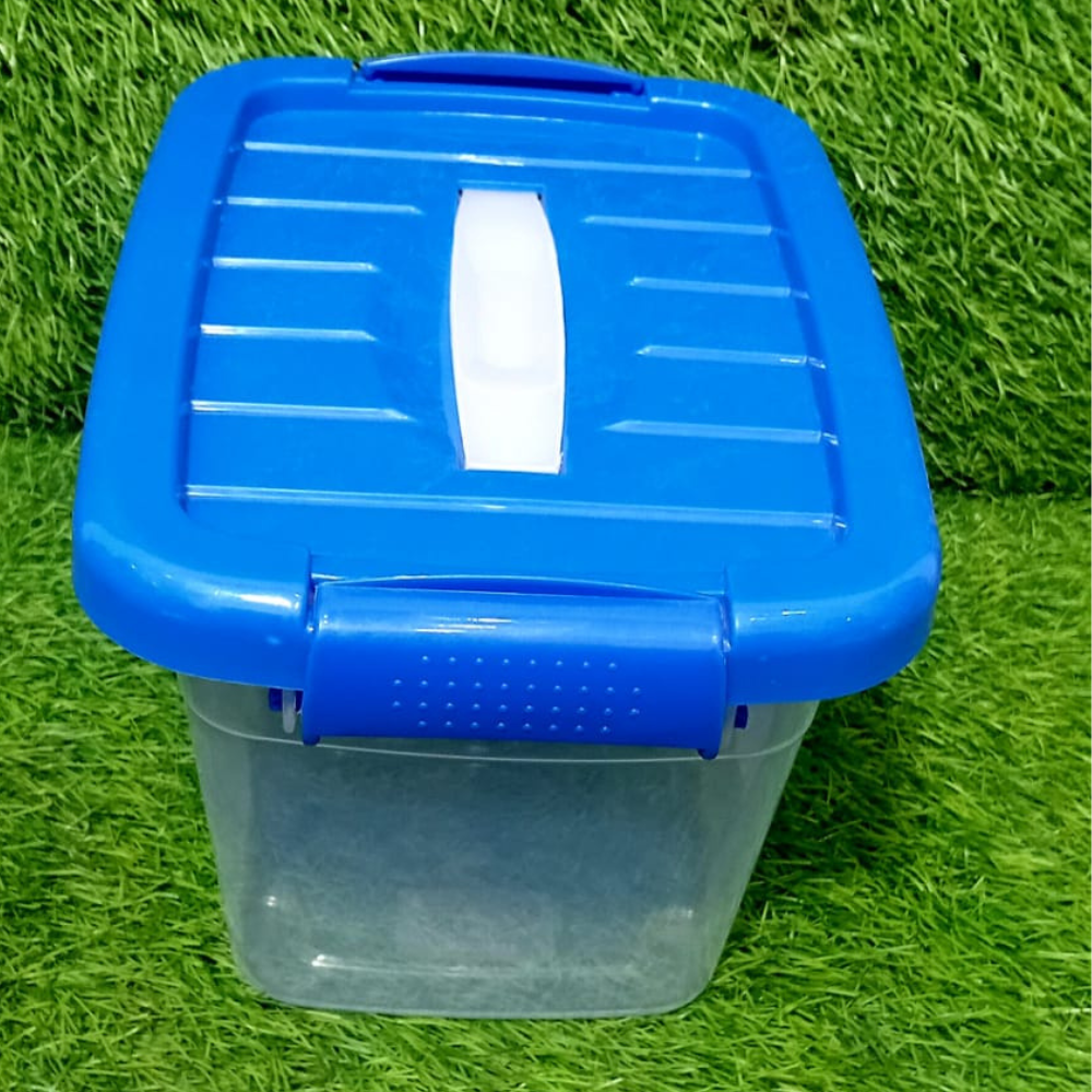Spacer Box Clear plastic container with a blue lid 